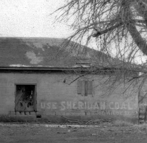Enhanced photo of Commissary building at Fort Laramie National Historic Site.  Fort Laramie NHS, Charles Downey Collection